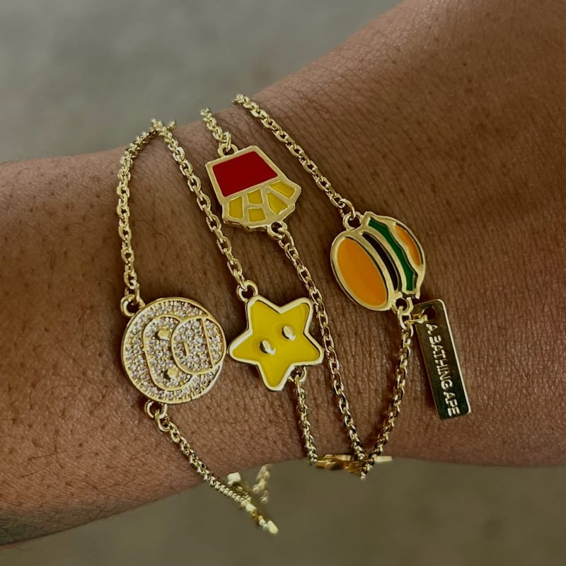 Travel detail with food charms and bracelets
